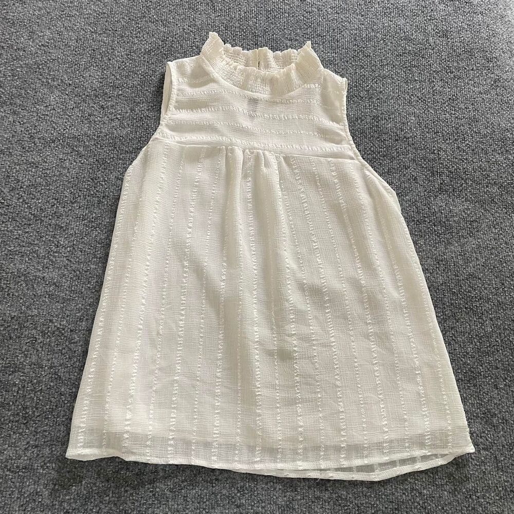 Ethereal feminine boho cream textured sleeveless blouse